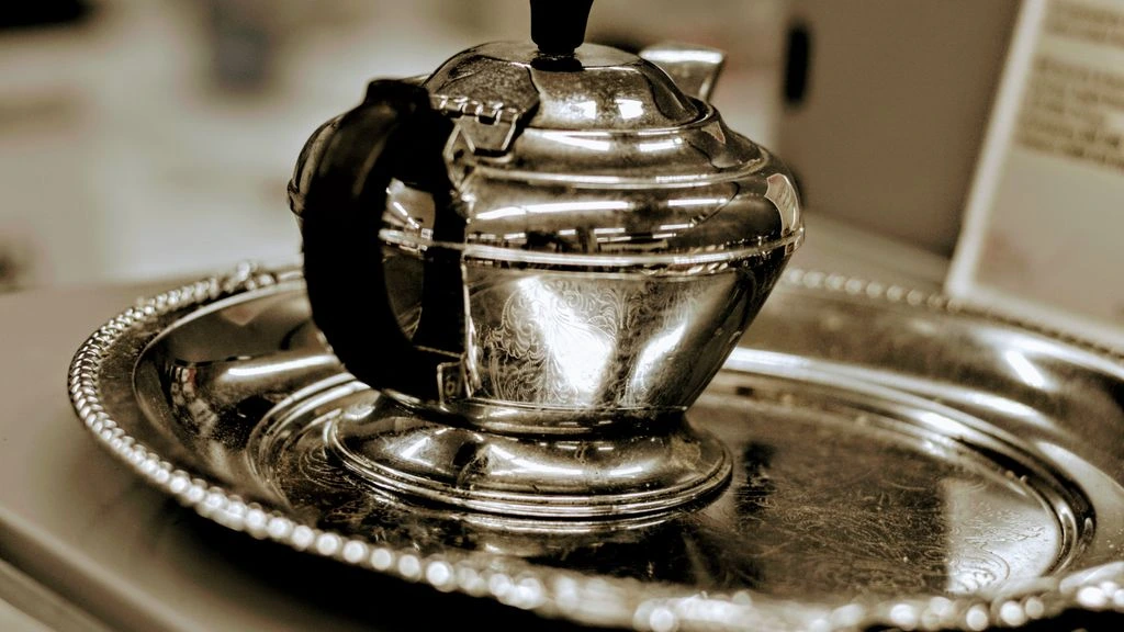 A Georgian silver tea urn, photographed in situ for the journal essay.