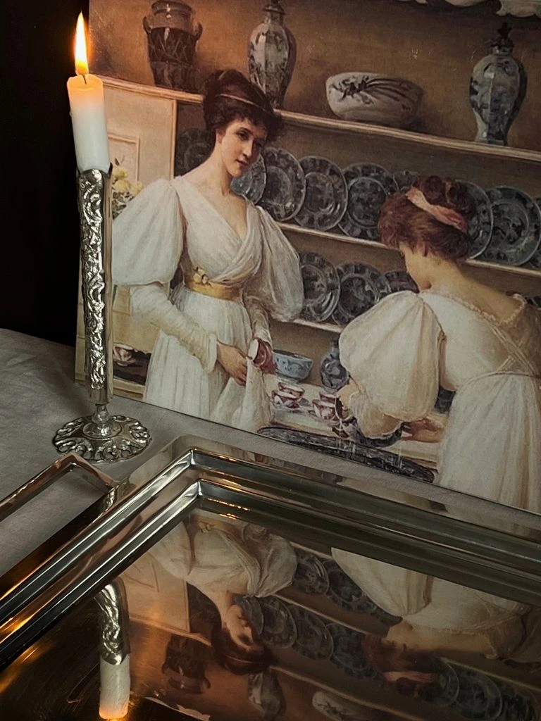A pair of Georgian silver candlesticks